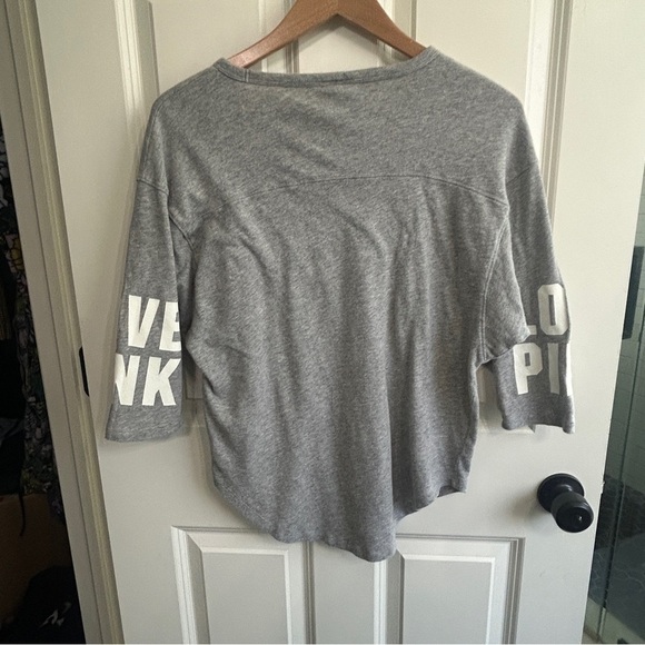 PINK Victoria's Secret Tops - GUC Pink by Victoria’s Secret size XS  dolman sleeve tee. LOVE PINK on sleeves.